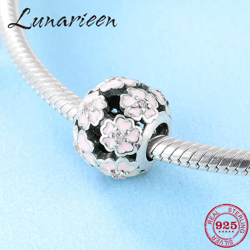 Pulsera Pandora con dijes en plata de ley 925