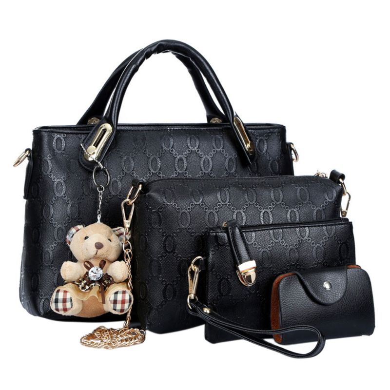 Bolso de mano de piel con cadena grabada